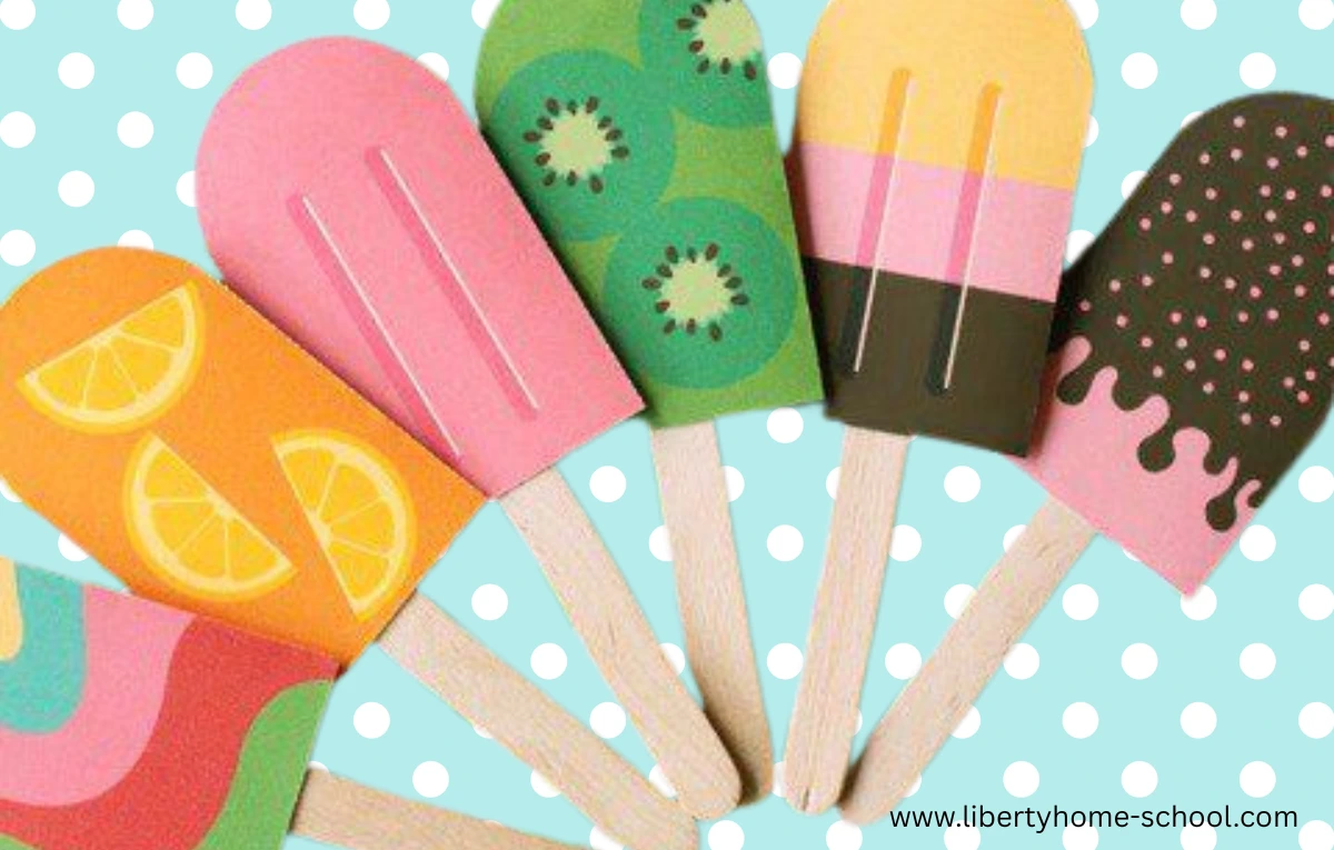 Free June Unit Studies to Make Learning Fun This Summer 2 June Unit Studies Colorful paper popsicle crafts featuring fruit designs like oranges, kiwi, and chocolate, displayed on a blue polka dot background. Fun summer craft for kids.