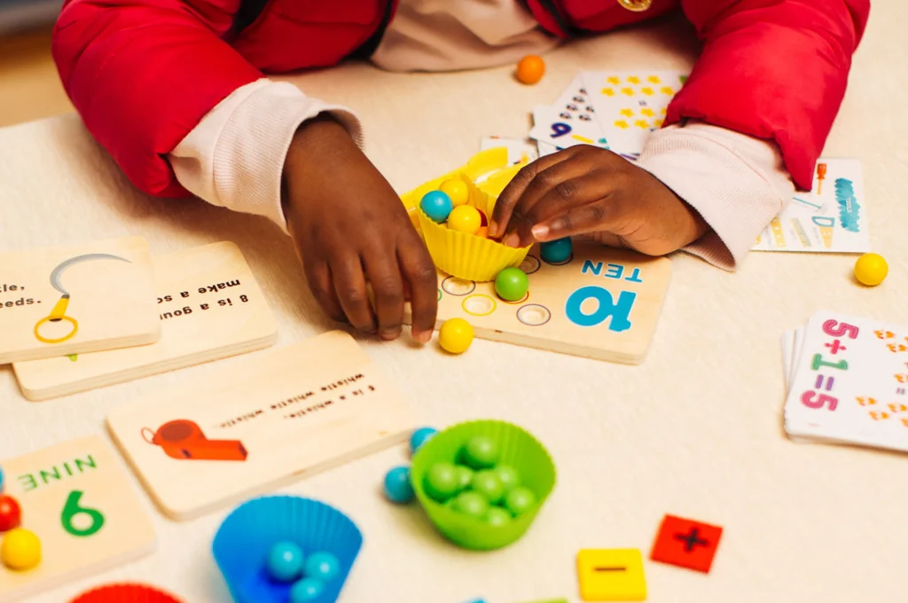 Kids playing fun math games that make learning enjoyable and stress-free