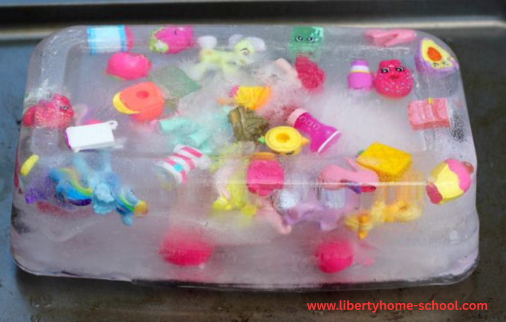 10 Summer Activities for Kids 5 Children using spoons and warm water to melt ice blocks and find hidden toys during a summer treasure hunt