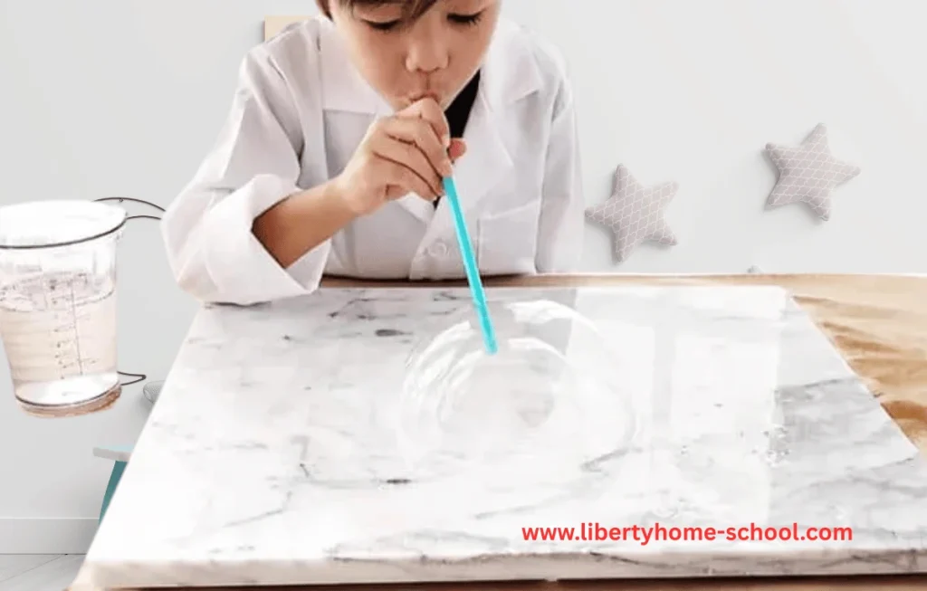10 Summer Activities for Kids 10 Children playing with colorful bubbles in a DIY Bubble Lab setup outdoors